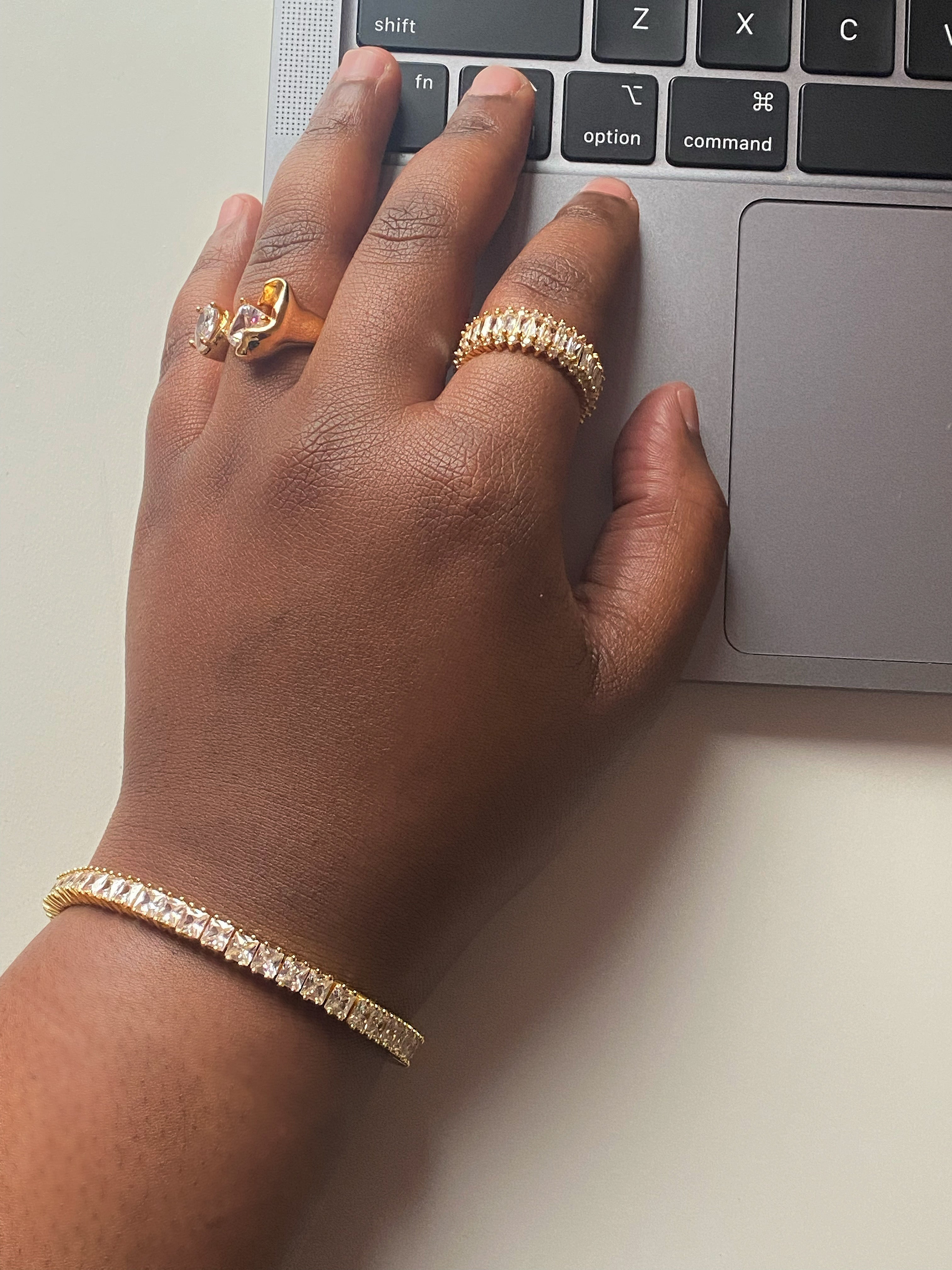 Gold color tennis bracelet